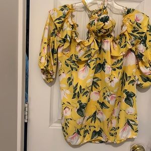 Floral top off the shoulders with flower that adds to the style